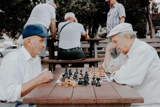 Old men playing chess.